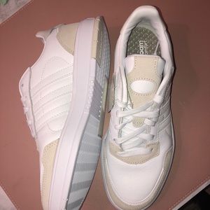 Brand new, never worn adidas sneakers